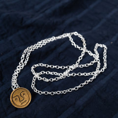 Penna Button Necklace Brass